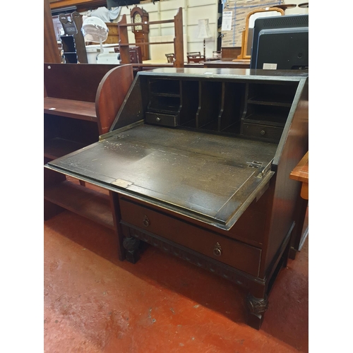 608 - Vintage Dark Oak Writing Bureau with Three Drawers Under Drop Front.