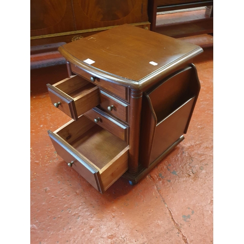 613 - Small Mahogany Table with Four Drawers & Magazine Holders on Casters.