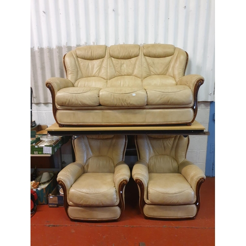 630 - Tan Leather Three Seater Sofa with Two Matching Arm Chairs.