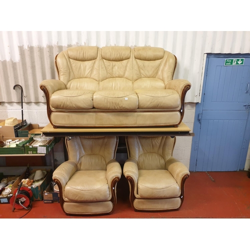 630 - Tan Leather Three Seater Sofa with Two Matching Arm Chairs.