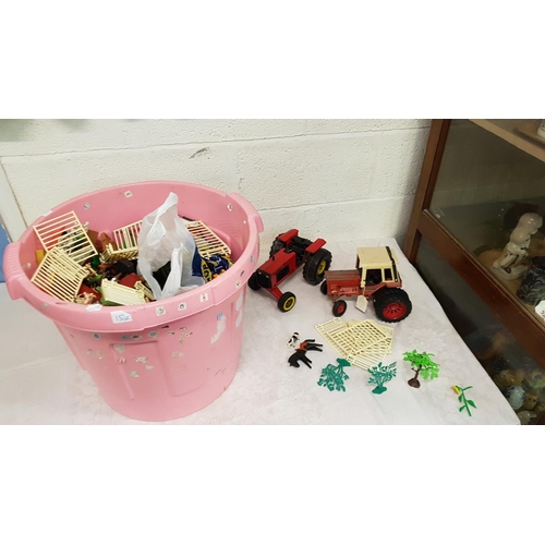 152 - Pink Storage Bin with Assorted Children's Toys & Farm Figures etc.