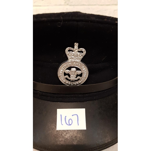 167 - Two Vintage Police Helmets and 