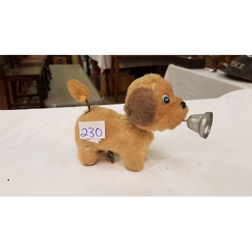 230 - Genuine Vintage Clockwork Dog with Bell & Waggy Tail - working.