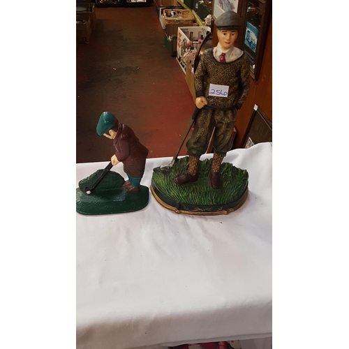 256 - Two Cast Golf Themed Door Stops.