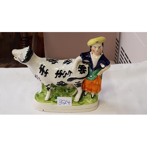 324 - Vintage Staffordshire Cow & Maid Figure.