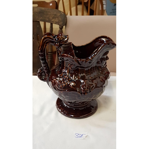 325 - Vintage Brown Treacle Jug with Mask Head Spout.