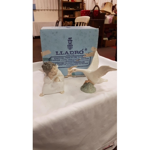 329 - Lladro Flying Goose & Sitting Angel Figures with Associated Box.