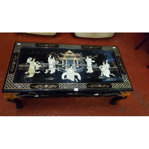 536 - Inlaid Black Lacquered Oriental Coffee Table - 42cm tall x 103cm long x 53cm wide.