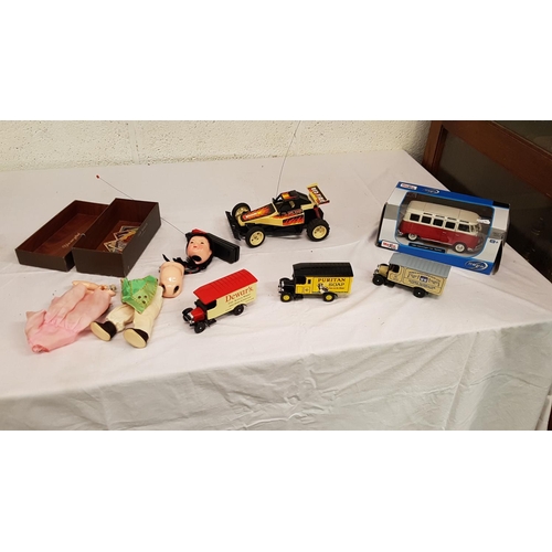 14 - Box of Toys Including Corgi Vans, Radio Controlled Car, Doll etc.