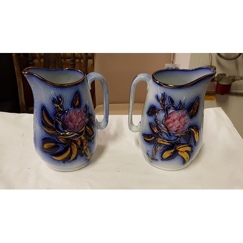 288 - Pair of Blue & White Floral Dresser Jugs - approx 7.5