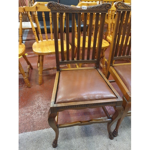 498 - Set of Four Vintage Oak Carved Dining Chairs with Leatherette Seats.