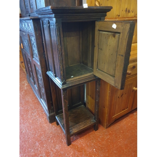 515 - Antique Carved Dark Oak Cupboard with Attached Legs - 127cm tall  x 47cm wide x 38cm deep.