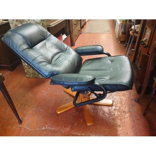 558 - Black Leather Effect Reclining Swivel Chair.