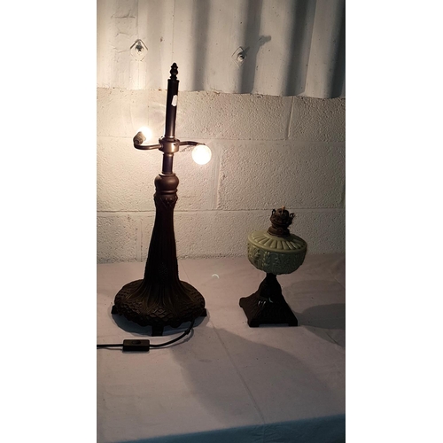 67 - Two Cast Metal Based Lamps - one is a burner oil lamp.