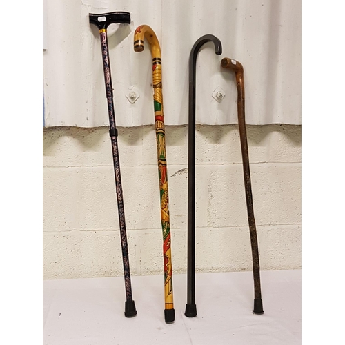 101 - Four Assorted Walking Sticks - One is Hand Decorated.