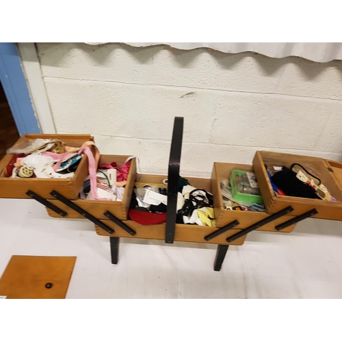 152 - Wooden Concertina Sewing Box with Contents Including Threads, Ribbons, Sewing Needles, Measuring Tap... 