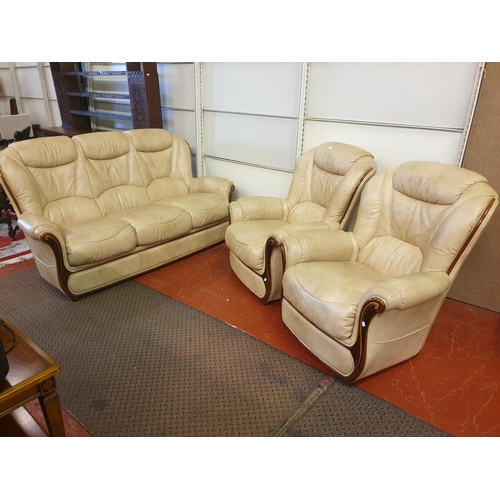 491 - Tan Leather Three Seater Sofa with Two Matching Arm Chairs.