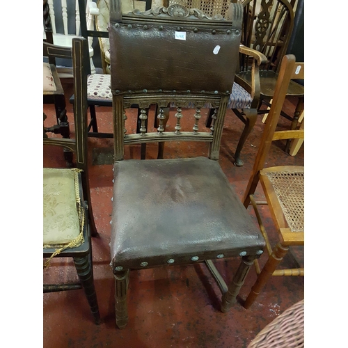 498 - Carved Oak Occasional Chair with Leather Back & Seat.