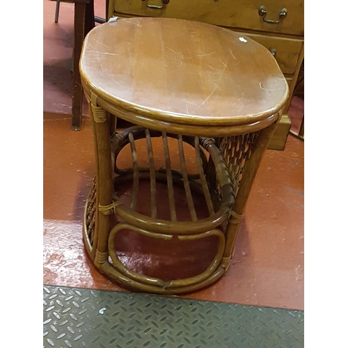 515 - Solid Topped Cane Oval Side Table - Approx 55cm tall x 62cm wide x 49cm deep.