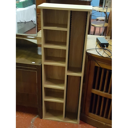 536 - Tall Light Oak Effect CD Tower - 113cm tall x 40cm wide x 20cm deep.