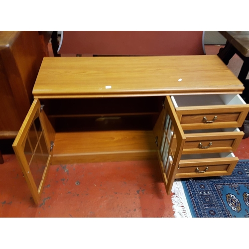 550 - Pine Effect TV Unit with Two Glazed Doors and Three Drawers - 2ft tall x 47