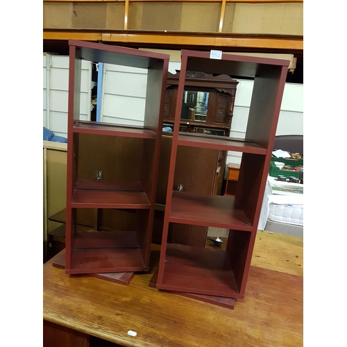 552 - Two Mahogany Effect Rotating DVD / Book Shelf Units - approx 76cm tall x 29cm square top.