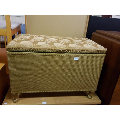 556 - Gold Lloyd Loom Style Blanket Box.