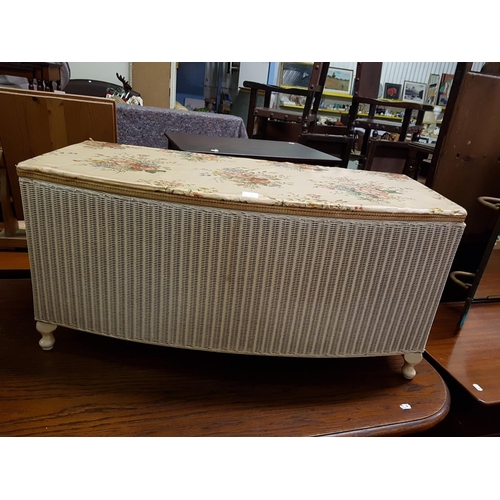 592 - Bow Fronted Lloyd Loom Ottoman.