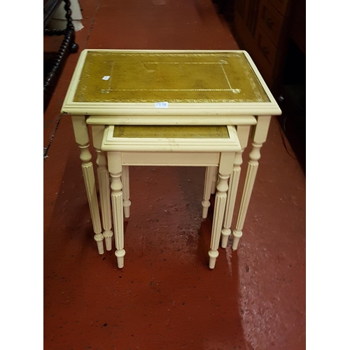 593 - Nest of Three Cream Tables with Tan Leather Inlay Top.