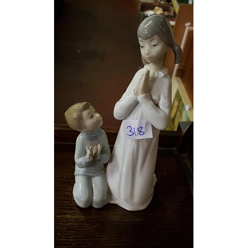 318 - Lladro Kneeling Boy & Girl Figure - approx 8