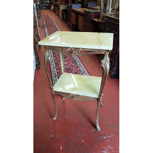 593 - Heavy Gilt Based Two Tier Onyx Occasional Table - 75cm tall, 47cm x 35cm top.