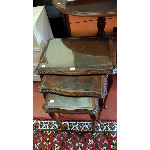 610 - Nest of Three Mahogany Tables with Glass Inlays.