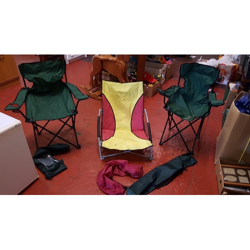 130 - Three Folding Camping Chairs in Carry Cases.