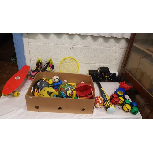148 - Box of Children's Toys and Games Including Roller Boots.