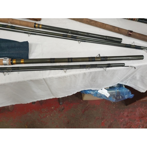 Three Fibreglass Course Fishing Rods.