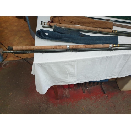 Three Fibreglass Course Fishing Rods.