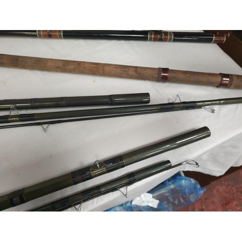 Three Fibreglass Course Fishing Rods.