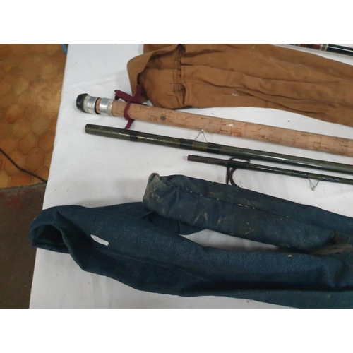 Three Fibreglass Course Fishing Rods.