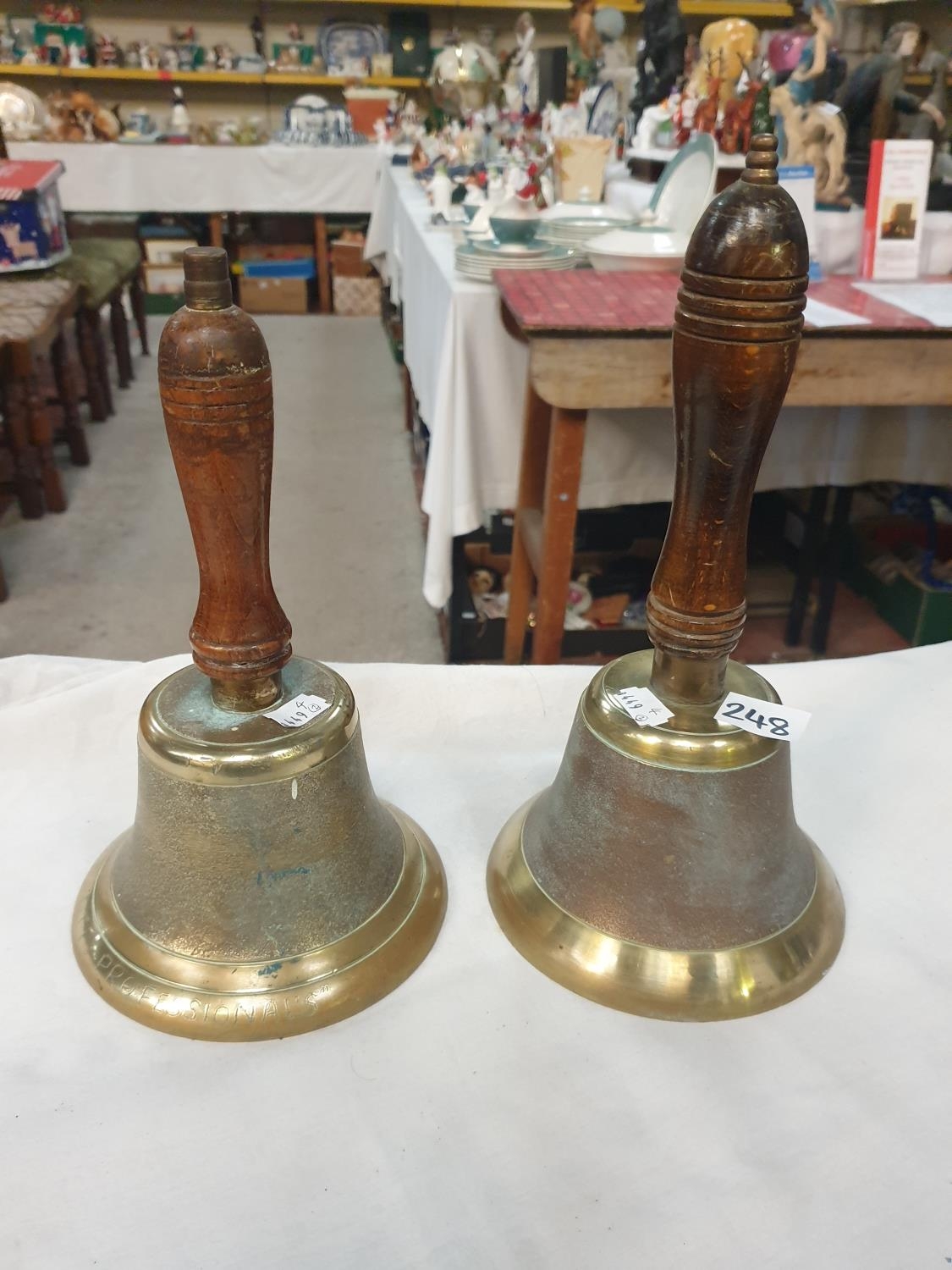 Two Heavy Brass Hand Bells.