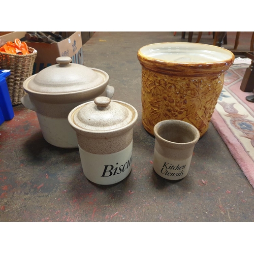 101 - Three Large Pottery Storage Jars Along with 30cm Tall Ceramic Jardinière.