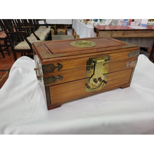 241 - Oriental Camphor Wood Jewellery Box with Brass Embellishments - 15cm high x 30cm long x 17cm deep.