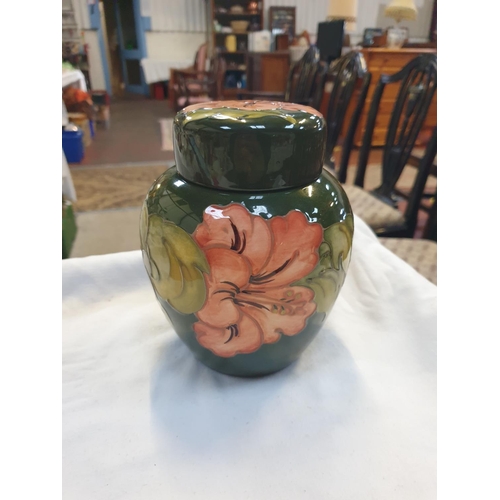 428 - Moorcroft Large Green Ground Coral Hibiscus Ginger Jar and Cover Initialled Walter Moorcroft Height ... 