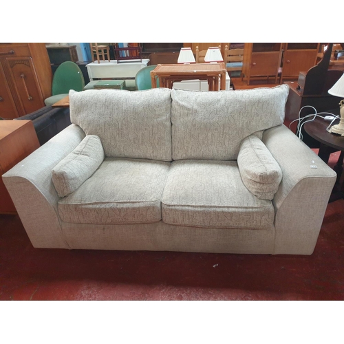 558 - Natural Coloured Upholstered Two Seater Settee - approx 6ft 4