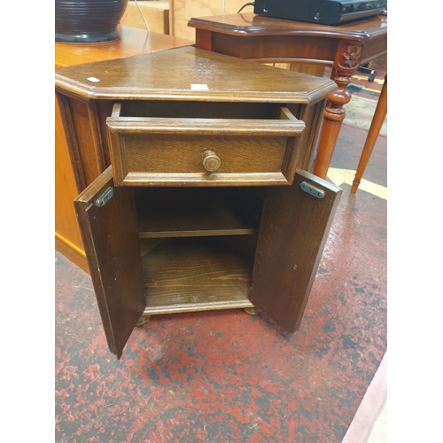 578 - Oak Floor Standing Corner Cabinet with Twin Doors & Single Drawer - approx 70cm tall.