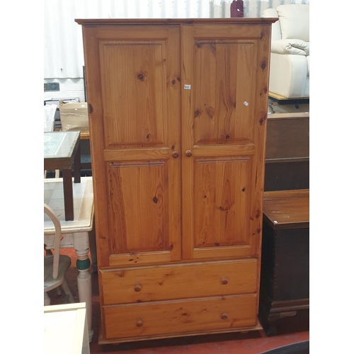 611 - Solid Pine Double Wardrobe over Two Full Length Drawers - approx 1.8m tall x 97cm wide x 54cm deep.
