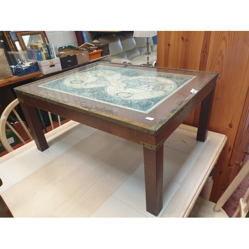 612 - Brass Edged Coffee Table with Global Map Under Glass Top - approx 37cm tall x 70cm long x 59cm wide.