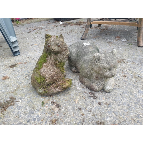 655 - Concrete 24cm Tall Sitting Cat & 40cm Laying Cat.