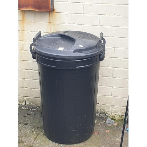 666 - Black Plastic Lidded Refuse Bin.