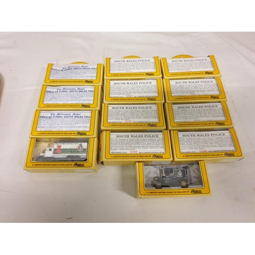 183 - 13 Boxed Limited Edition Lledo South Wales Police Vans.