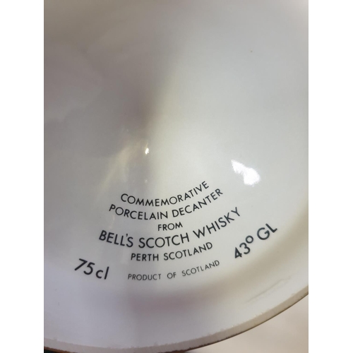 207 - Sealed Wade Commemorative Porcelain Bell's Scotch Whiskey Decanter with Contents.